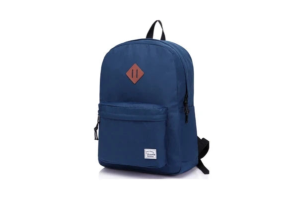 Dark blue Vaschy UltraLight Backpack with a front zip pocket, diamond patch and woven brand label.