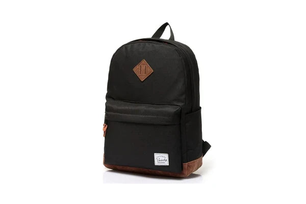 Black Vaschy ClassicPack backpack with front zipper pocket and brown bottom trim.