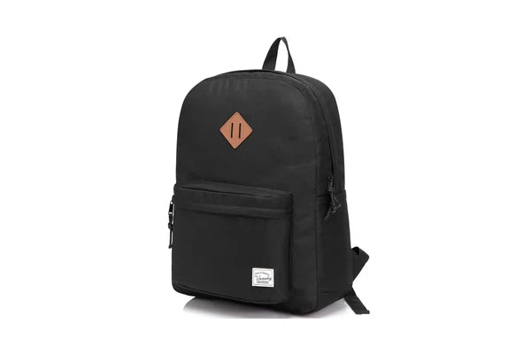 Black Vaschy UltraLight Backpack with front zipper pocket and woven brand label.